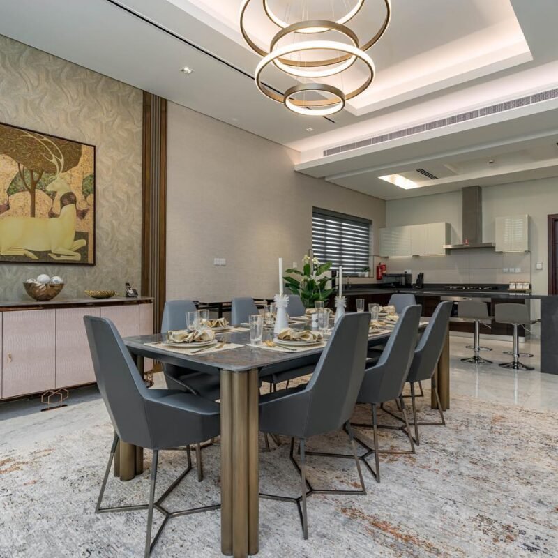 Dining Room designed in Contemporary theme n colour palette with use of earthy colours neautral palette with antique…